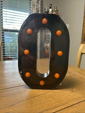 Monogram “O” lights up!